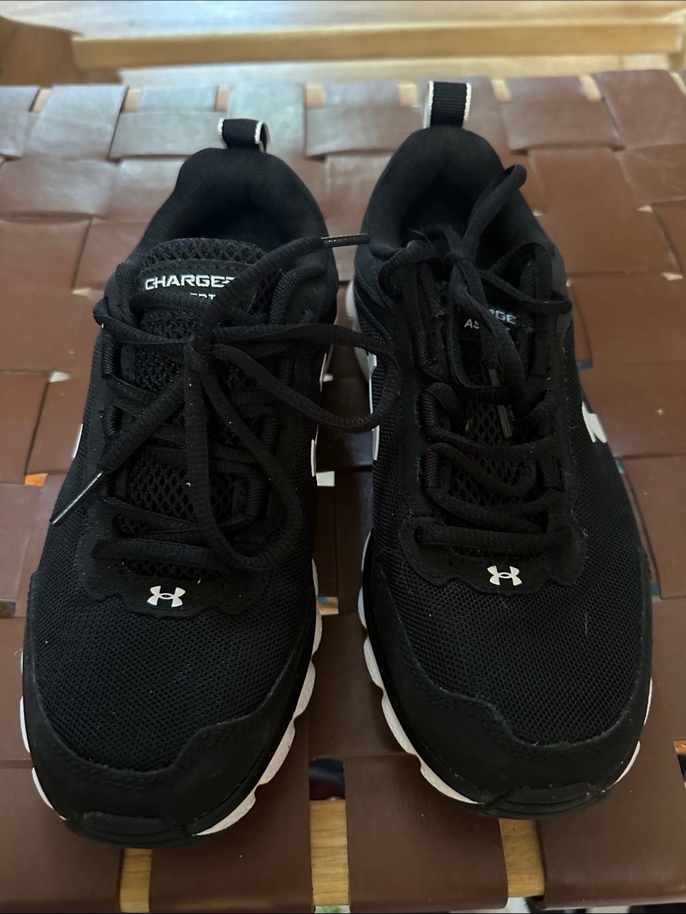 Under Armour Black and White Charged Cushioning Athletic Shoes